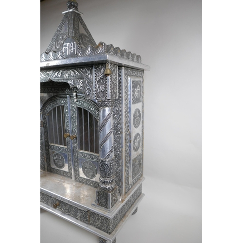 127 - An Indian white metal veneered wooden table top shrine, 46 x 26cm, 82cm high