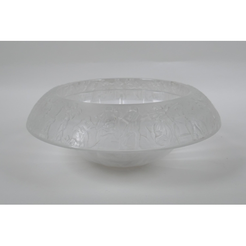 137 - A vintage heavy glass ice bowl with a classical design to the rim, 27cm diameter