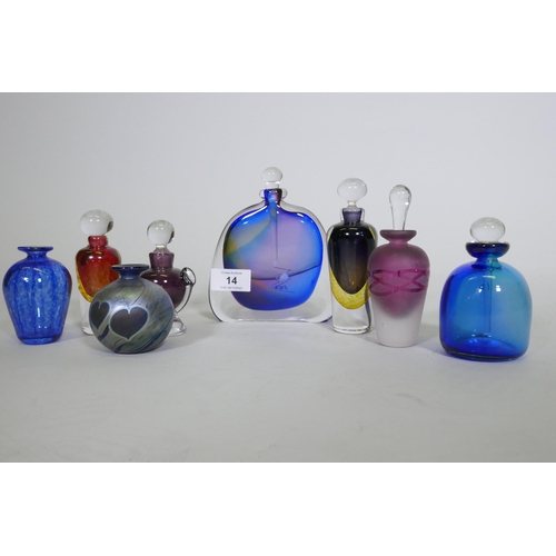 14 - A collection of scent bottles, David Wallace, urn shaped bottle, squat blue bottle, Keith Bowlby (no... 