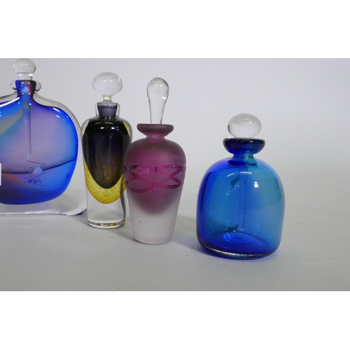 14 - A collection of scent bottles, David Wallace, urn shaped bottle, squat blue bottle, Keith Bowlby (no... 