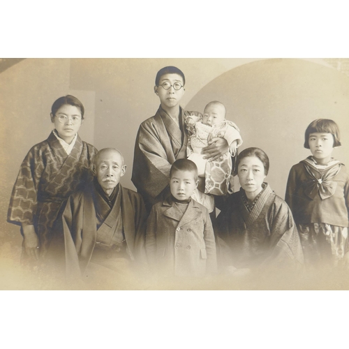 141 - A collection of late C19th and early C20th Japanese portrait photographs, a copy of Army Club cigare... 