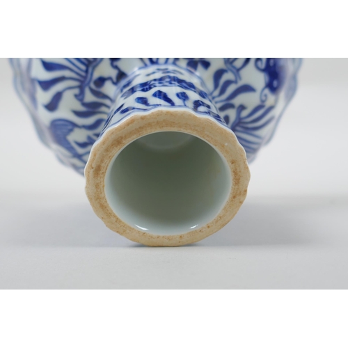 148 - A Chinese blue and white porcelain stem bowl of lobed form decorated with carp in a lotus pond, Xuan... 