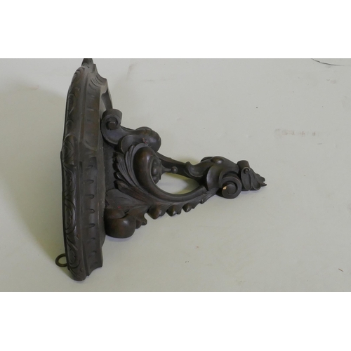 15 - A C19th carved walnut wall bracket, 40cm wide, 29cm high