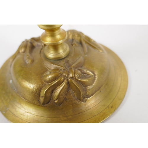 154 - An unusual brass candlestick with Arabic inscription to the base and raised insect decoration, 16cm ... 