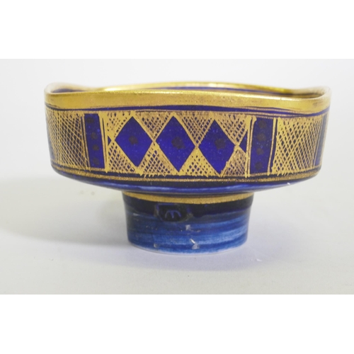 158 - Mary Rich, studio pottery bowl, gilt decorated on a deep blue glaze, 10cm diameter