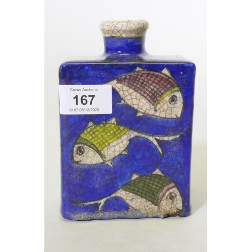 167 - An Iznik ceramic flask decorated with fish on a blue glaze, 15cm high