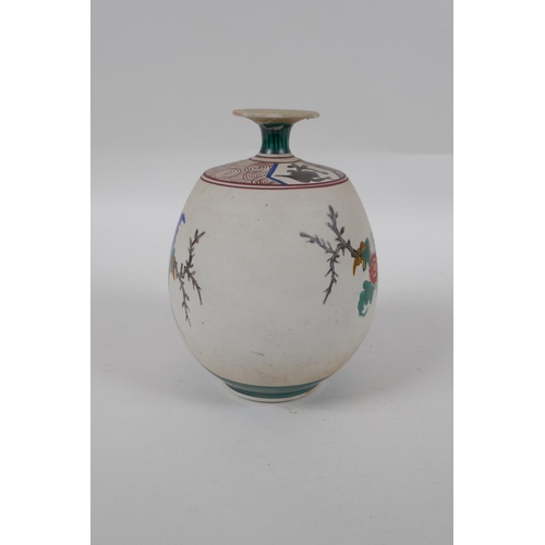 172 - A Japanese unglazed ceramic vase with famille vert enamel bird and flower decoration, mark to base, ... 