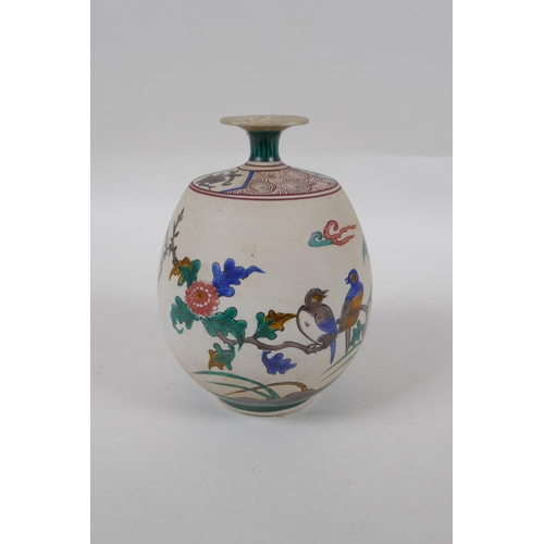 172 - A Japanese unglazed ceramic vase with famille vert enamel bird and flower decoration, mark to base, ... 