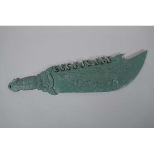 180 - A Chinese carved mottled green hardstone chopper, 51cm long