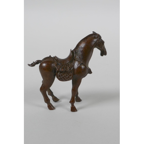 183 - A Chinese bronze figure of a Tang style horse, 7cm high