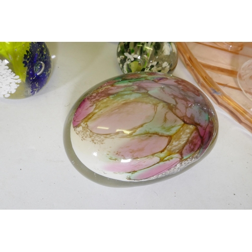 186 - A collection of glass paperweights, including a Charles Sorrel Studio, carnival glass bowl, dressing... 