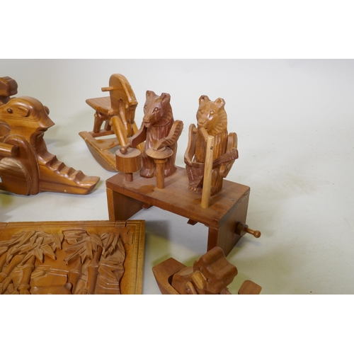 187 - A collection of wood puzzles and toys, aeroplane, 26cm long