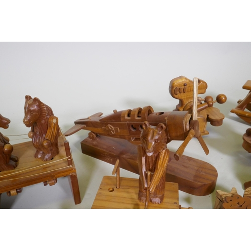 187 - A collection of wood puzzles and toys, aeroplane, 26cm long