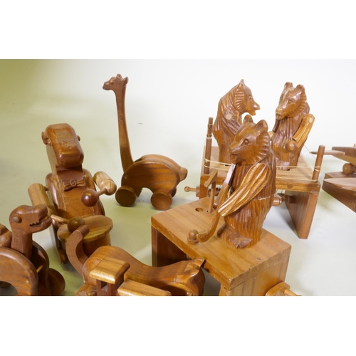 187 - A collection of wood puzzles and toys, aeroplane, 26cm long