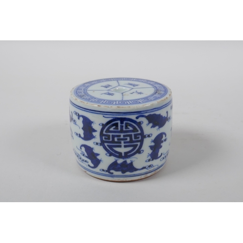 193 - A Chinese blue and white porcelain drum shaped candlestick decorated with bats and auspicious symbol... 