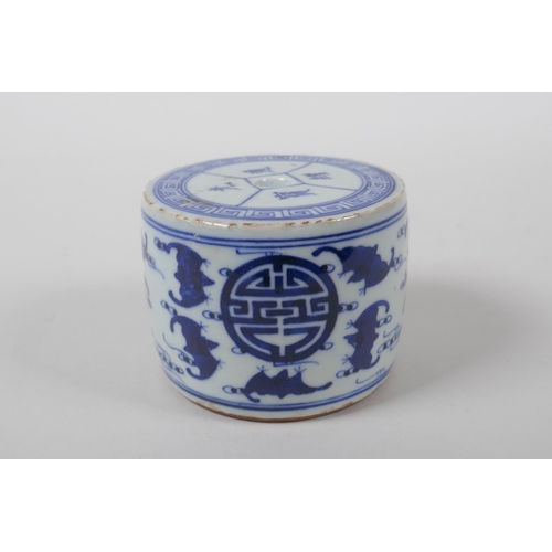 193 - A Chinese blue and white porcelain drum shaped candlestick decorated with bats and auspicious symbol... 