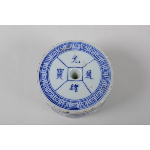 193 - A Chinese blue and white porcelain drum shaped candlestick decorated with bats and auspicious symbol... 