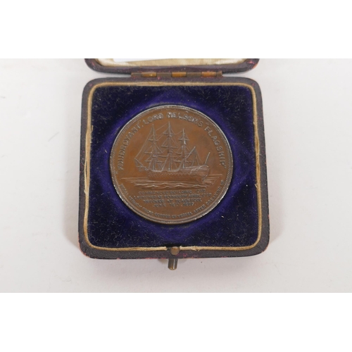 201 - An 1897 Lord Nelson 'Foudroyant' flagship commemorative coin, struck in copper salvaged from the wre... 