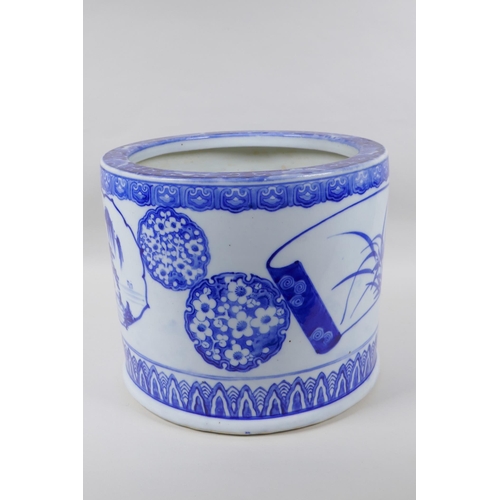 213 - A Chinese blue and white porcelain cylinder jardiniere, with landscape and floral decoration, 26cm h... 