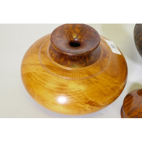 22 - Treen, a New Zealand Rimu and Totana burr wood turned pot, signed to base Jim Ross, 19cm diameter, a... 