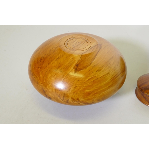 22 - Treen, a New Zealand Rimu and Totana burr wood turned pot, signed to base Jim Ross, 19cm diameter, a... 