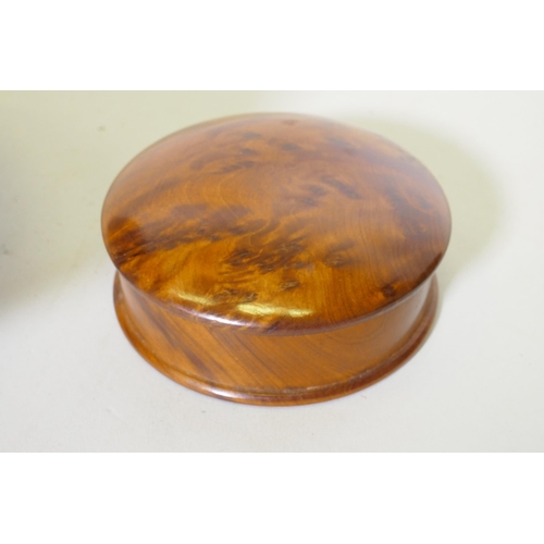 22 - Treen, a New Zealand Rimu and Totana burr wood turned pot, signed to base Jim Ross, 19cm diameter, a... 