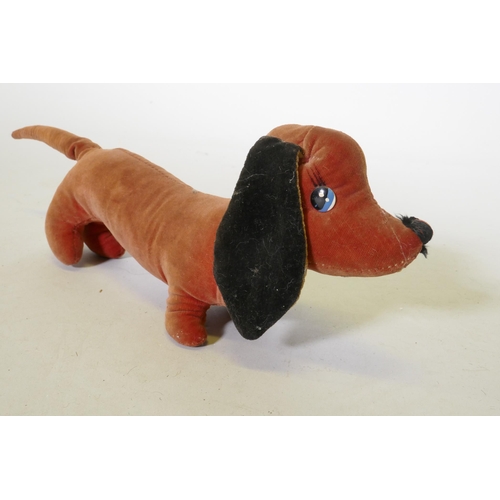 220 - A vintage velvet toy dachshund, possibly Merrythought, 32cm long