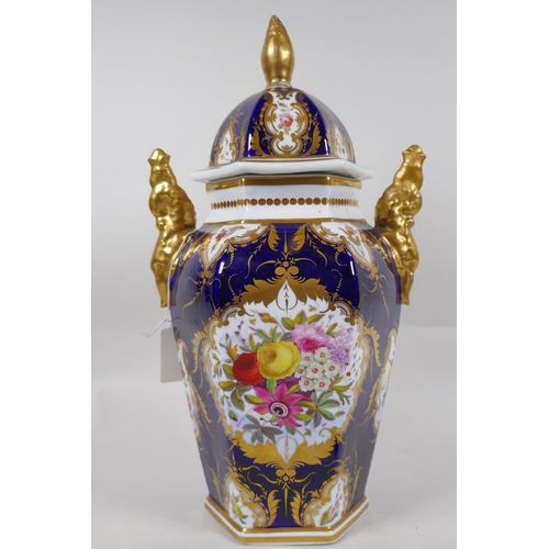 223 - An antique continental porcelain jar and cover with gilt highlights and hand painted floral decorati... 