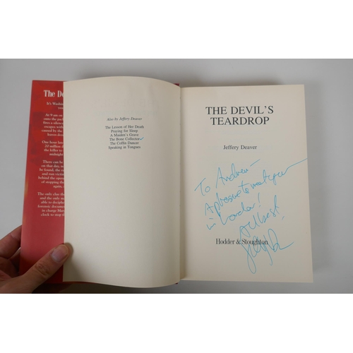 225 - Five signed hard back books to include Himalaya by Michael Palin, America by Stephen Fry, The Devil'... 