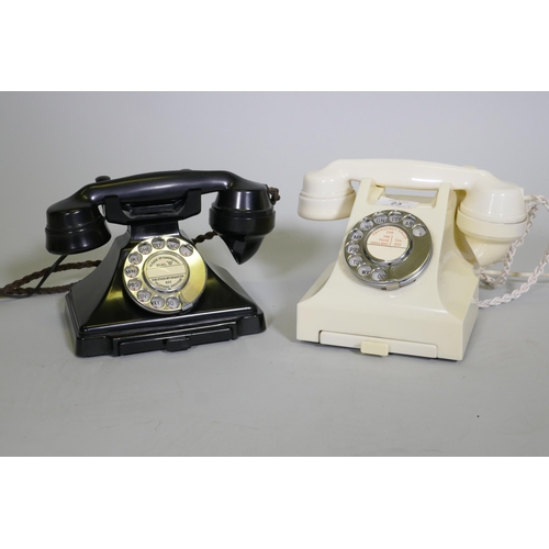 23 - A vintage black GPO telephone with pull out slide, type 223F, and another in white, type 332L