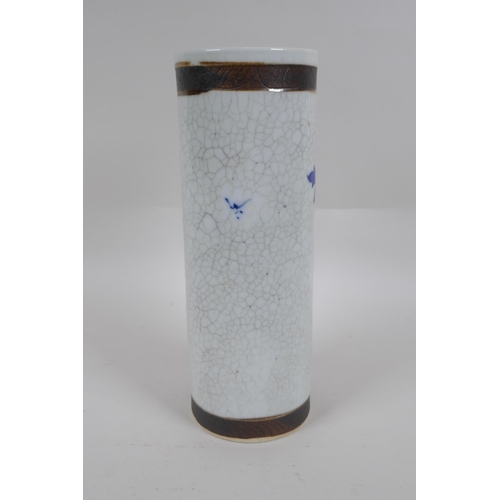 236 - A Chinese blue and white crackleware cylinder vase with bronze style bands and decorated with a bird... 