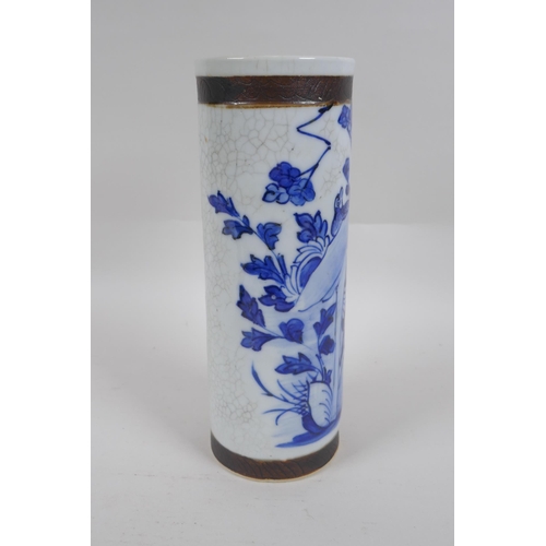 236 - A Chinese blue and white crackleware cylinder vase with bronze style bands and decorated with a bird... 