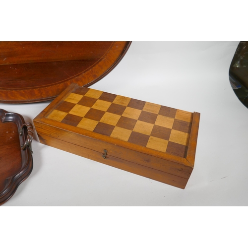 237 - An antique inlaid mahogany oval serving tray, a smaller mahogany serving tray and a chess board, lar... 