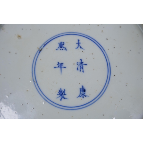 241 - A famille vert porcelain dish with rolled rim, decorated with warriors in a landscape, Chinese KangX... 