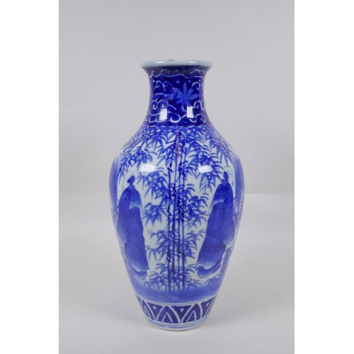 248 - A Chinese blue and white porcelain vase decorated with sages in a bamboo forest, 30cm high