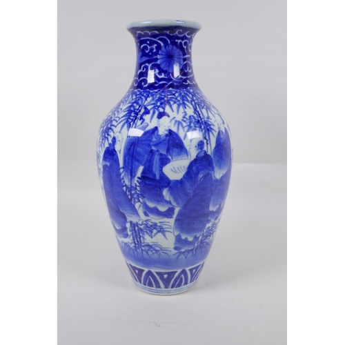 248 - A Chinese blue and white porcelain vase decorated with sages in a bamboo forest, 30cm high