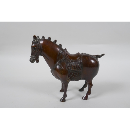 258 - A Chinese bronze figure of a Tang style horse, 14cm high