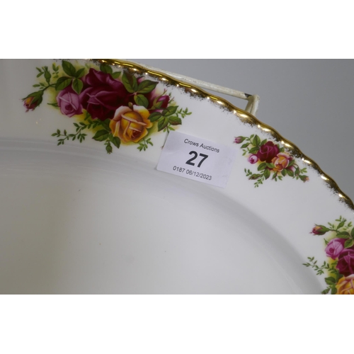 27 - A Royal Albert Country Rose six place dinner service, with serving plates, tureens etc, appears unus... 