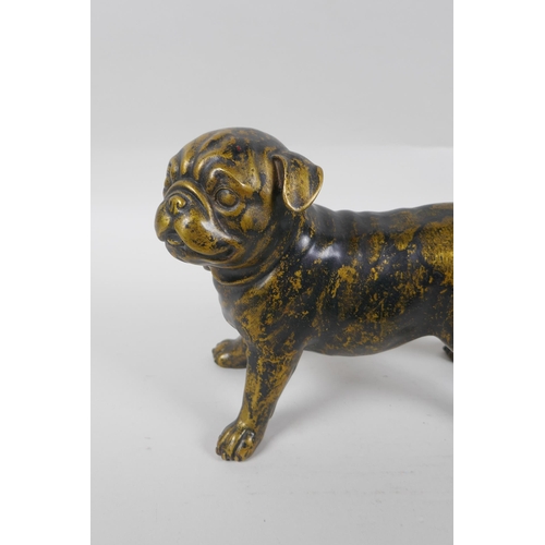 272 - A filled gilt bronze pug dog, 21cm long