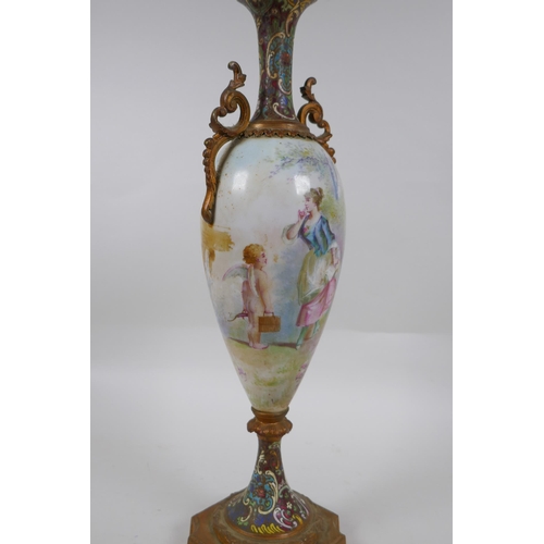 276 - A C19th French ormolu and porcelain urn, decorated with a putto and lady, signed Daly, with champlev... 