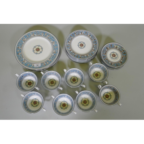 33 - A Wedgwood Florentine turquoise eight place part dinner service, plate 27cm diameter