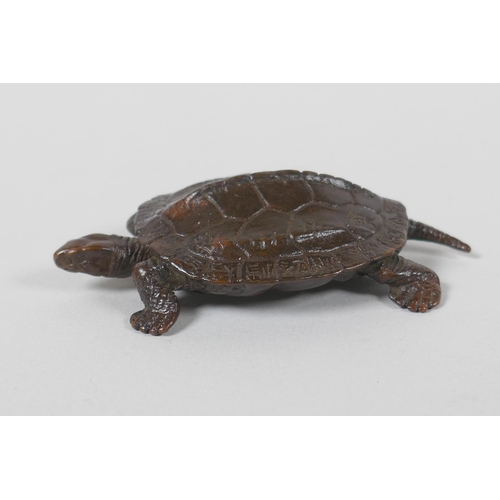 34 - A Japanese style bronze okimono tortoise, 7cm long