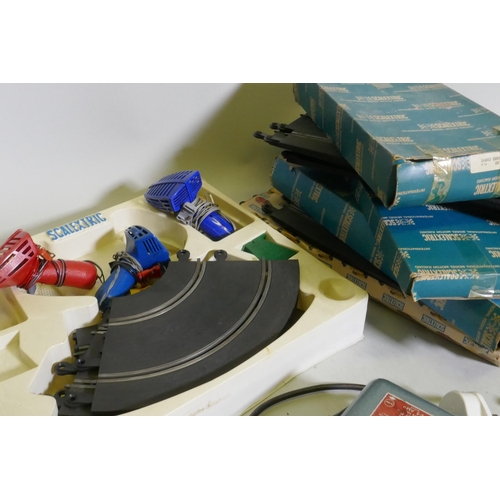 35 - 1960s/70s Scalextric track, controllers and transformer