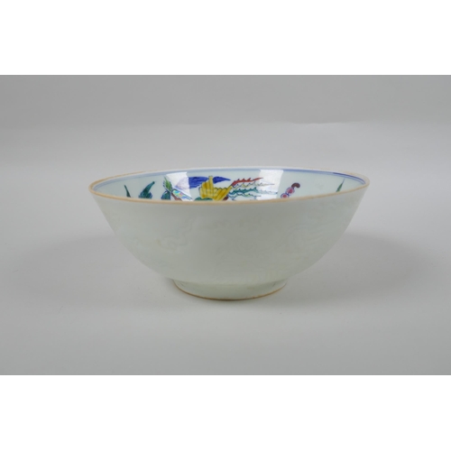 38 - A Chinese porcelain bowl with wucai enamel bird decoration to the interior and incised dragon decora... 