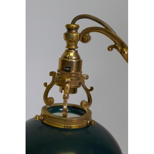 41 - An ormolu table lamp with adjustable painted toleaware shade, the base with fine engraved and pierce... 