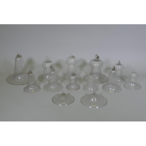 44 - A collection of antique glass bell jars, largest 30cm high