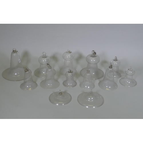 44 - A collection of antique glass bell jars, largest 30cm high