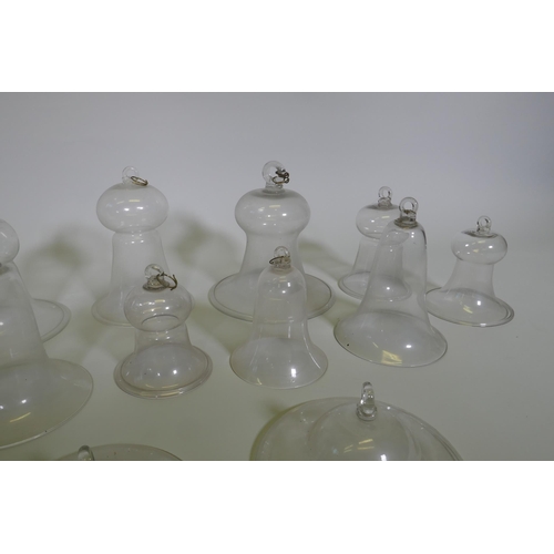 44 - A collection of antique glass bell jars, largest 30cm high