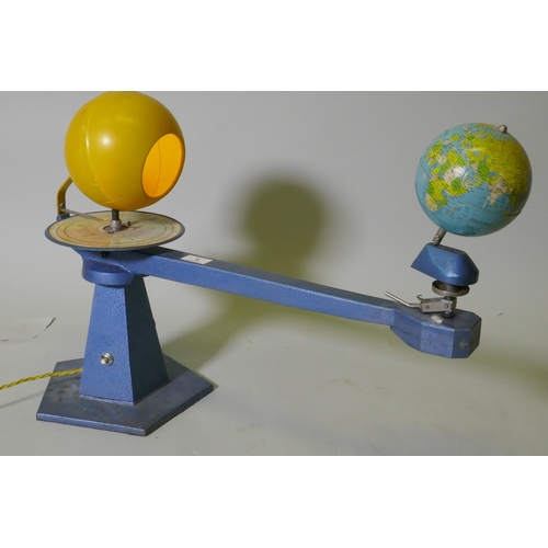 5 - A vintage German tinplate and metal tellurium, with illuminating sun, lacks crank and moon, 67cm x 4... 