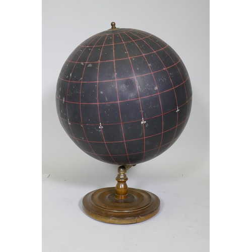 6 - A Philips slate surface globe, with brass mounts and wood base, 65cm high